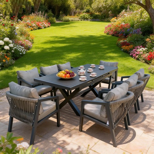 Grey outdoor dining furniture with exposed aluminium frames and an extendable table